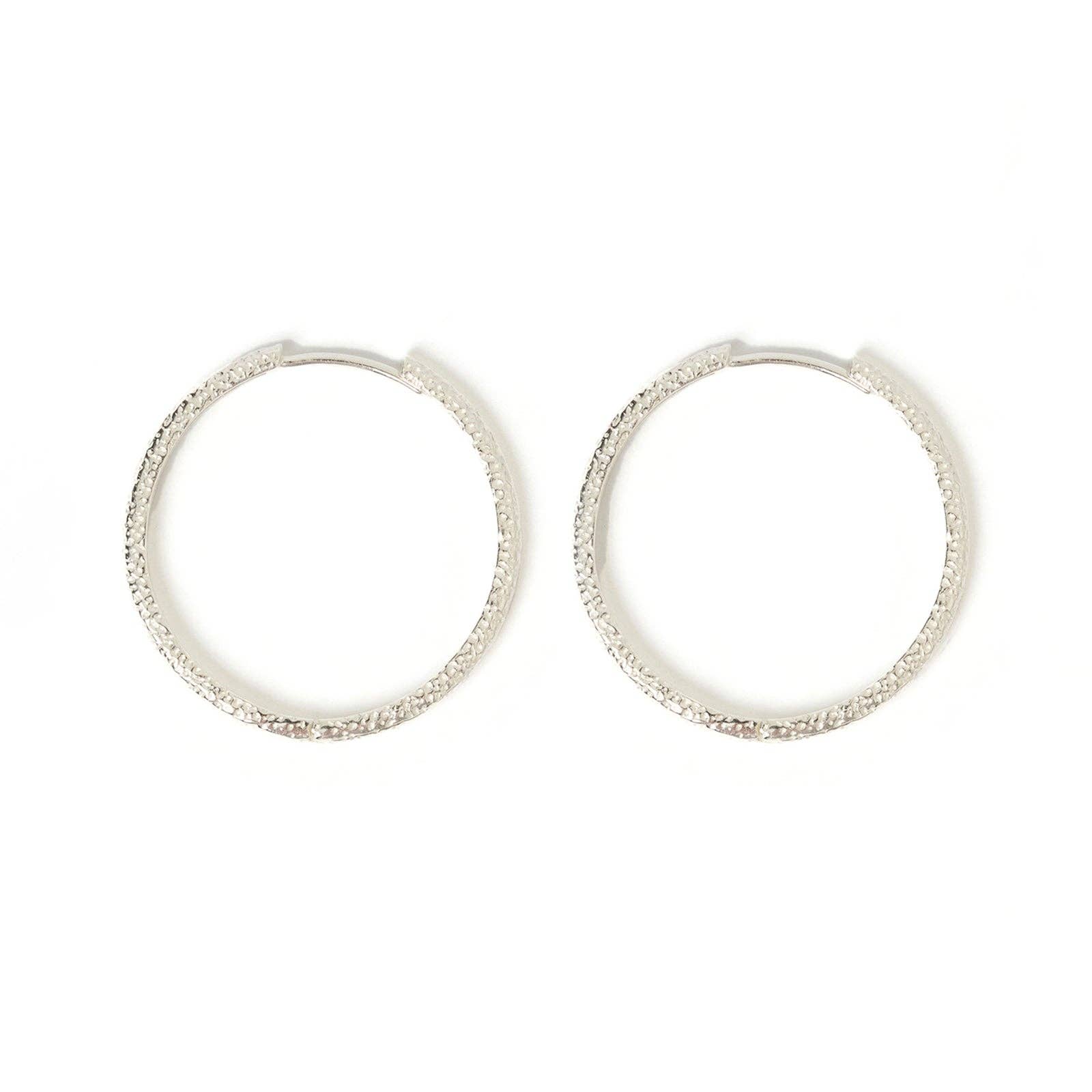 Arms of Eve Sebastian Silver Hoop Earrings