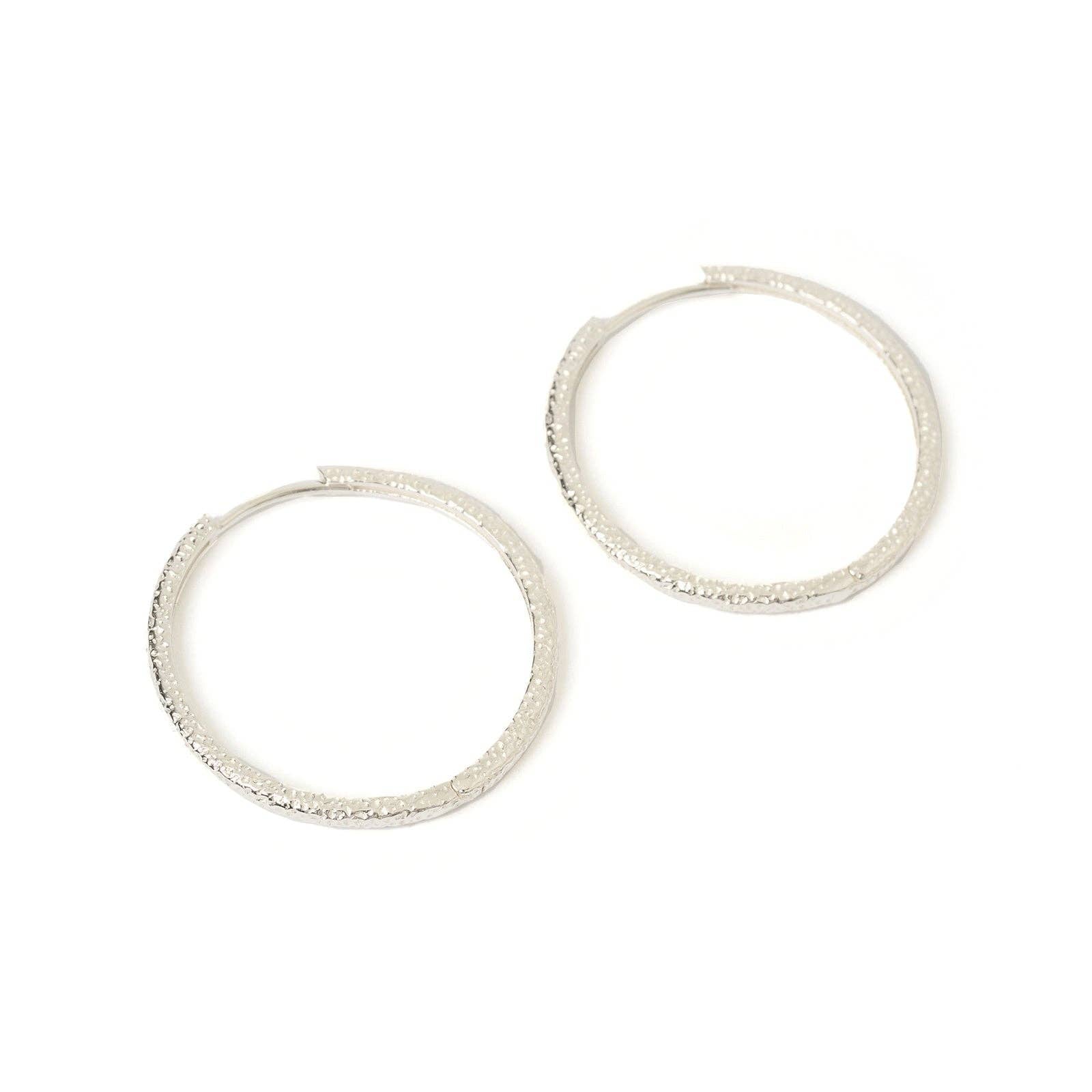 Arms of Eve Sebastian Silver Hoop Earrings